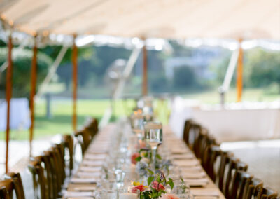 Beautiful wedding setting beneath outdoor tent