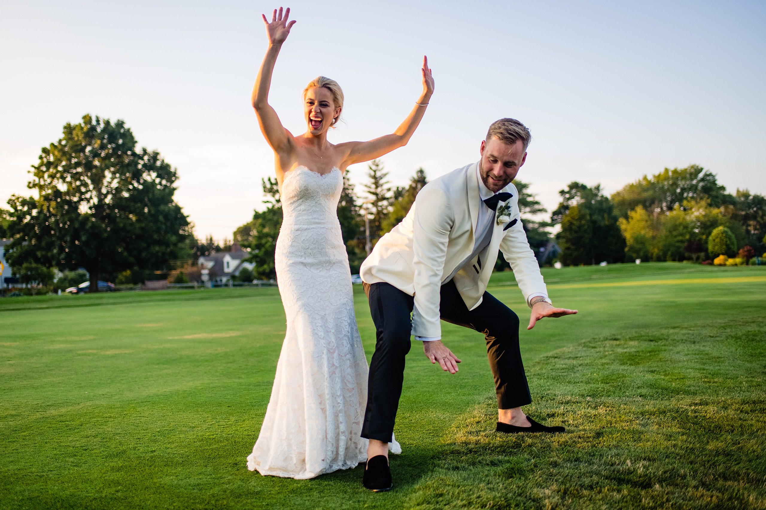 Bride and groom funny photo outdoors