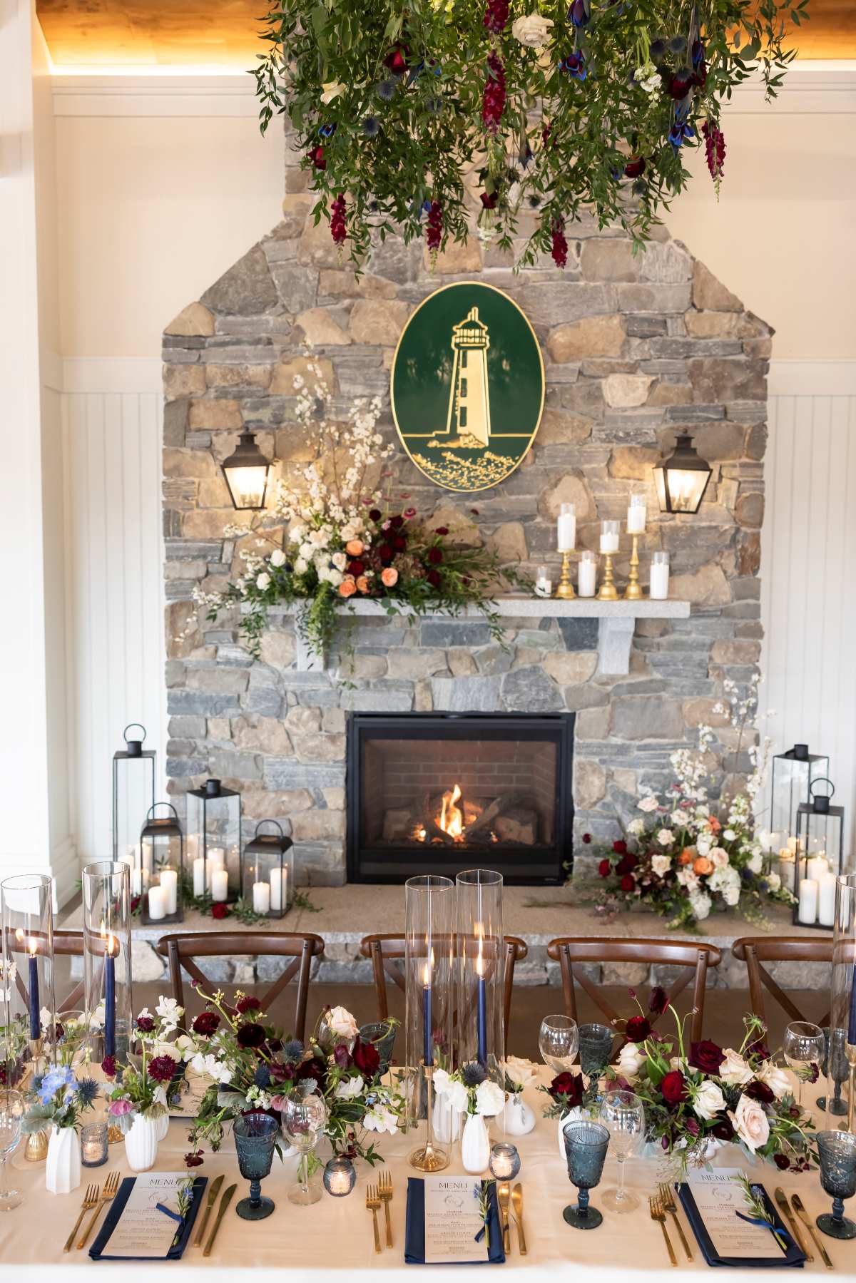 A beautifully arranged wedding reception table adorned with elegant candles and vibrant flowers, creating a romantic ambiance.