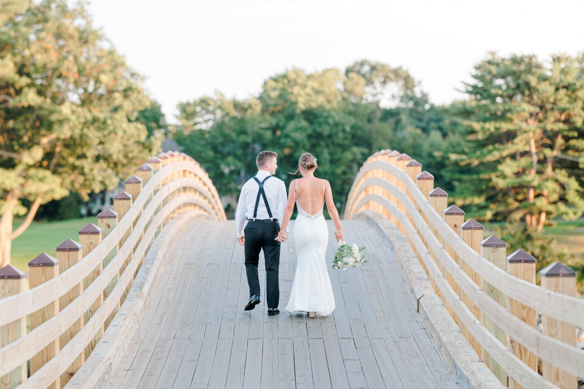 A wedding photographer capturing an elegant seaside wedding in Portsmouth, NH, showcasing love and beauty by the shore.