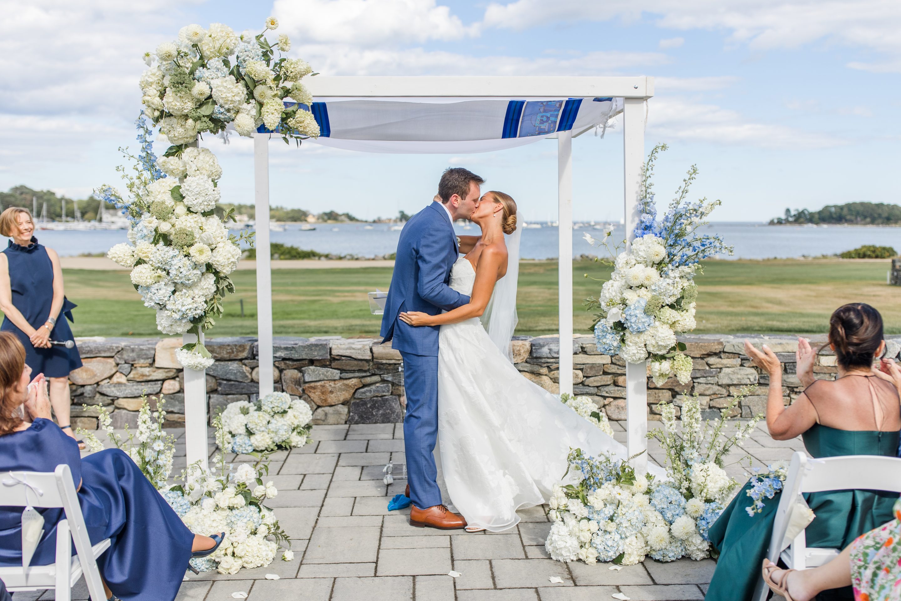 bride and groom on golf cart