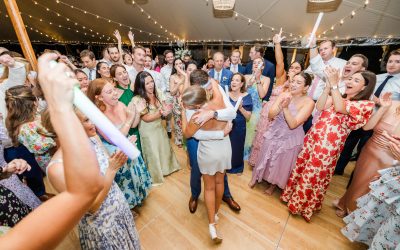 Live Band or DJ? Choosing the Right Entertainment for Your Wedding Reception